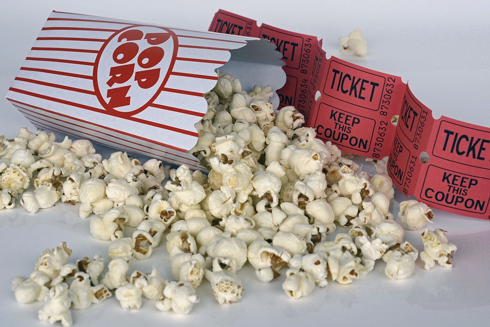 Popcorn spilling with tickets 