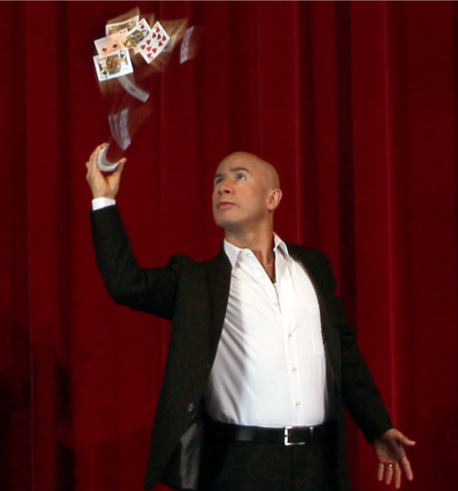 Cesar Domico doing a card trick 