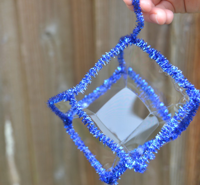 Pipe cleaners in a cube making a square bubble 