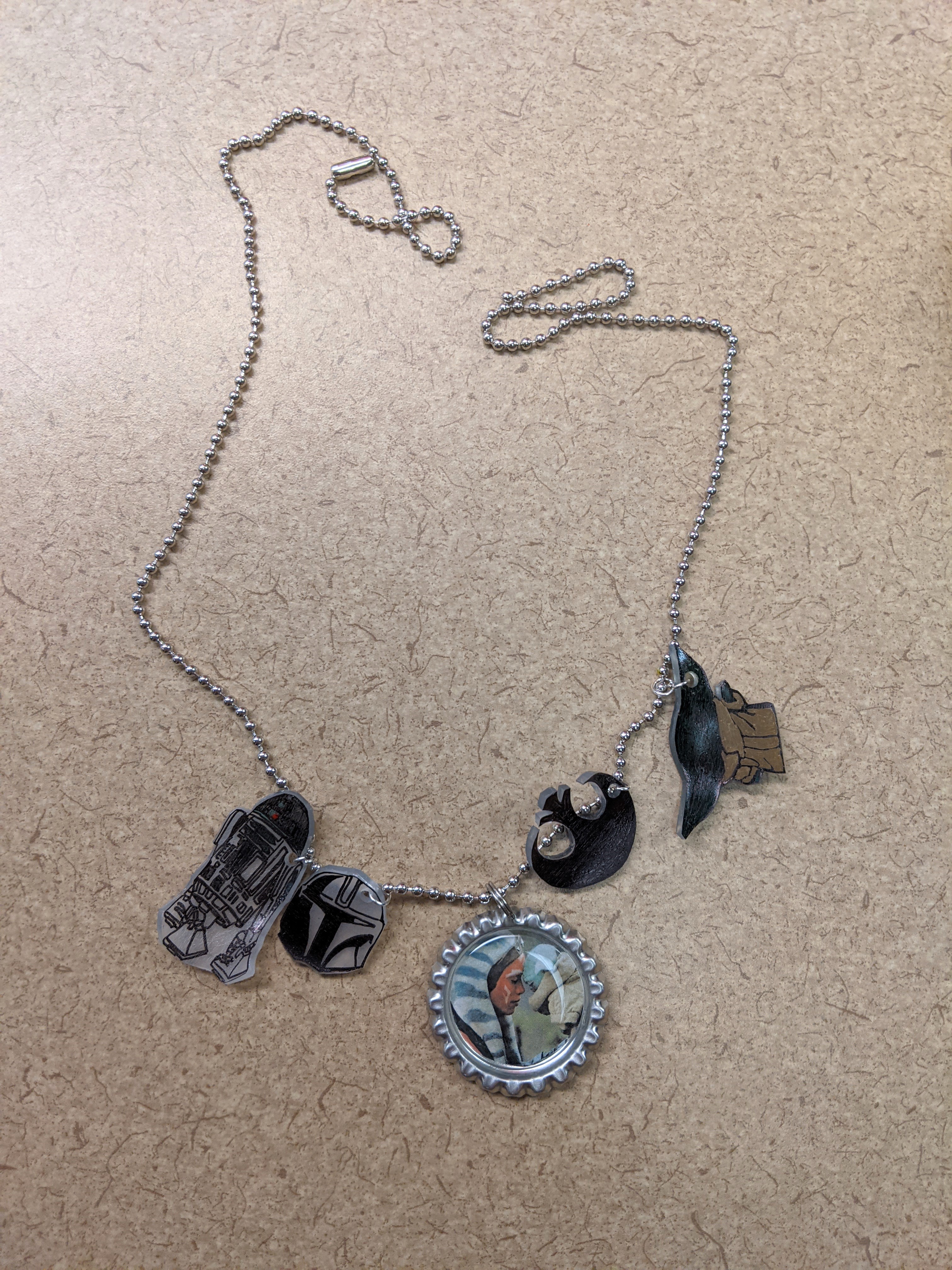 Bottlecap necklace with shrinky dinks attached