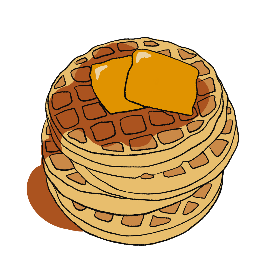 Stack of waffles with syrup and butter
