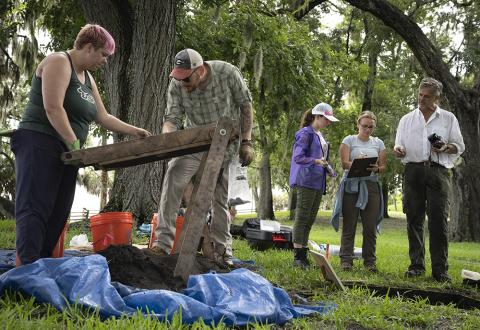 Thomas Pluckhahn and students excavating in Phillipe Park