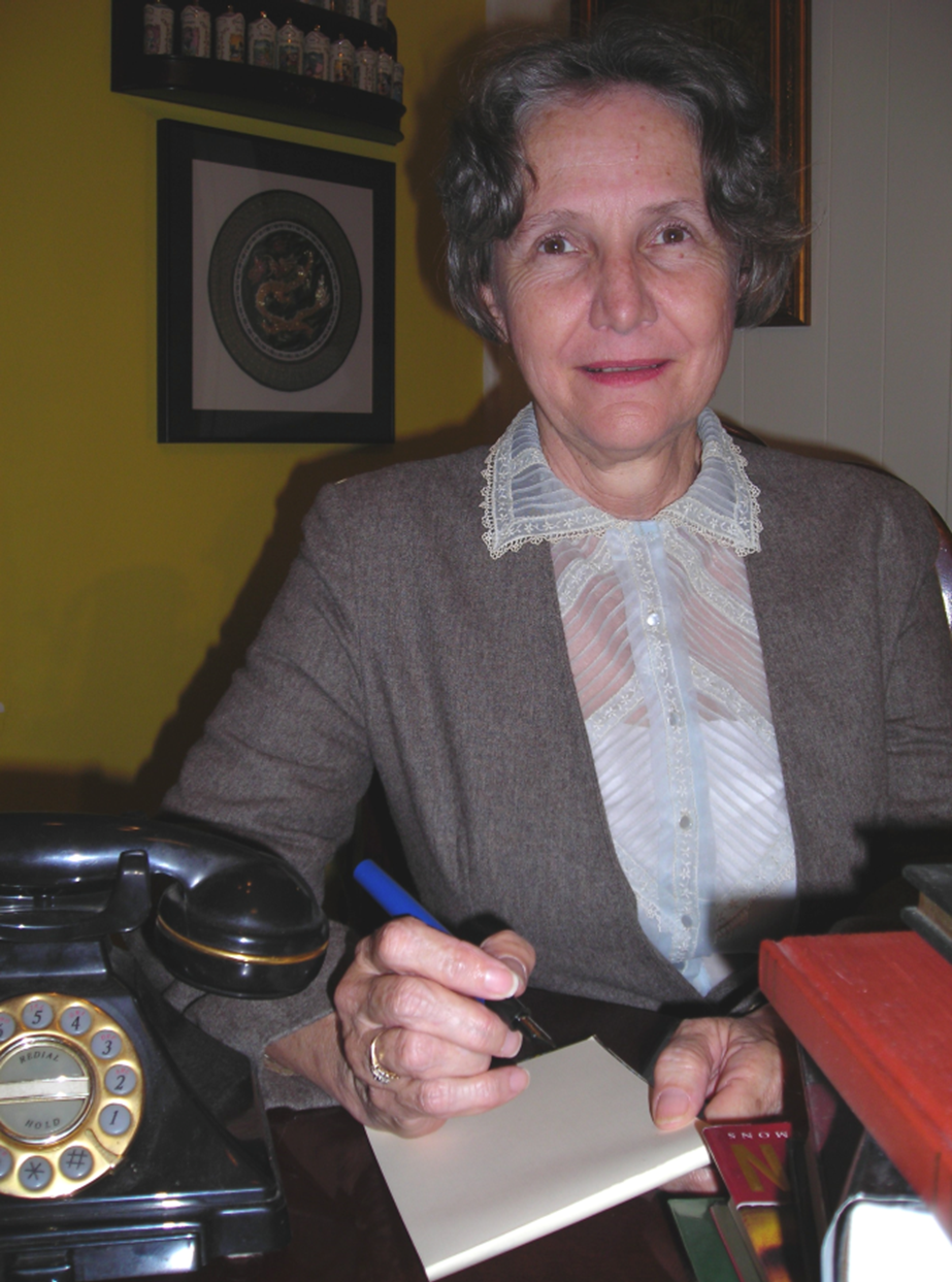 Nan Colton as Agatha Christie