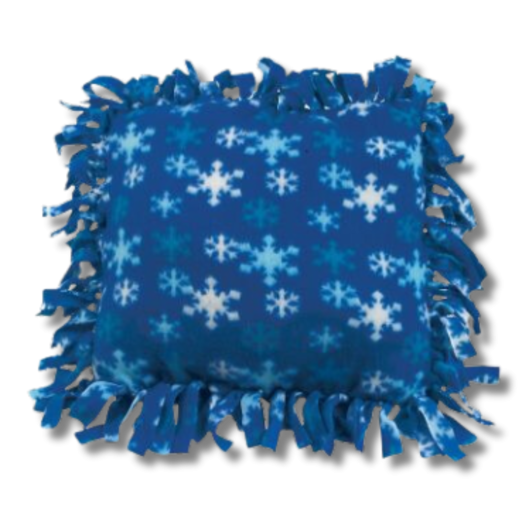 Blue fleece pillow with snowflakes on it